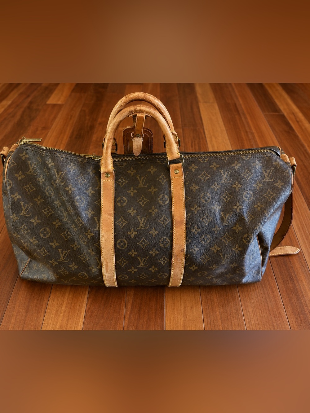 Louis Vuitton Monogram Canvas Keepall Duffel Bag in Brown and Tan